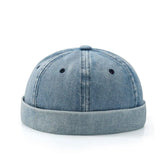 Blue denim cap on a white background