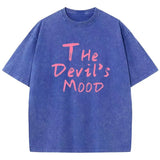 Blue Devil's Mood washed oversized graphic tee styled with low-rise denim
