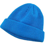 Blue knit beanie on a light gray background