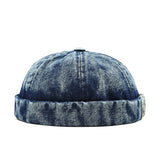 Blue denim beanie on a white background