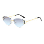 Sunglasses with gold frame and blue arms on a white background