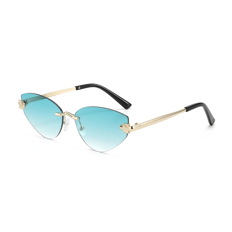 Sunglasses with gold frame and blue gradient lenses on a white background