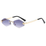 Sunglasses with gold frame and black arms on a white background