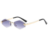 Sunglasses with gold frame and black arms on a white background