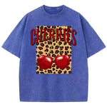 Blue-Xy379 Cherry leopard print short sleeve graphic tee on model, standing