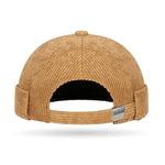 Brimless corduroy docker cap, angled view showing texture