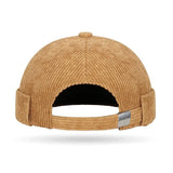 Brimless corduroy docker cap, angled view showing texture