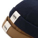 Brimless cotton skull cap worn, side view