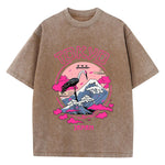 Brown Full-length view of women's oversized acid wash graphic tee showing length