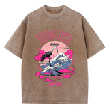 Brown Full-length view of women's oversized acid wash graphic tee showing length