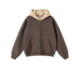 Brown hoodie with beige hood on a light gray background