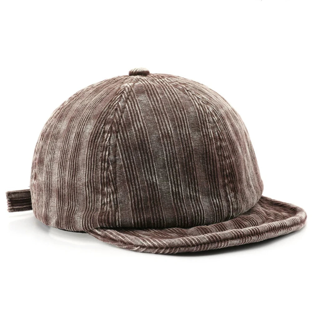 Brown Baseball Cap Short brim corduroy baseball cap on model, angled view