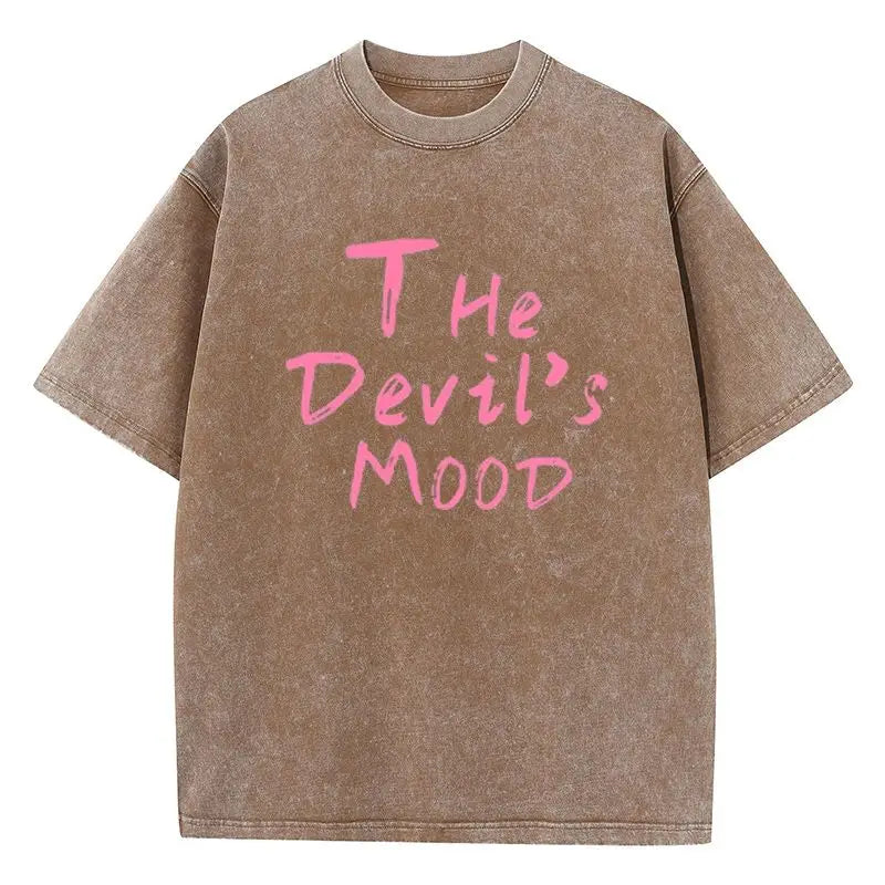 Brown Devil's Mood washed oversized graphic tee — styled streetwear editorial shot