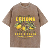 Brown lemon graphic tee, close-up of fruit print graphic detail