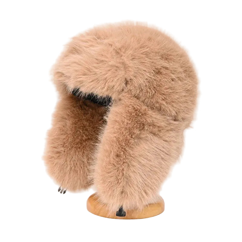 Brown fur U-shaped neck warmer on a wooden mannequin head against a white background