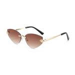 Sunglasses with gold frame and brown gradient lenses on a white background