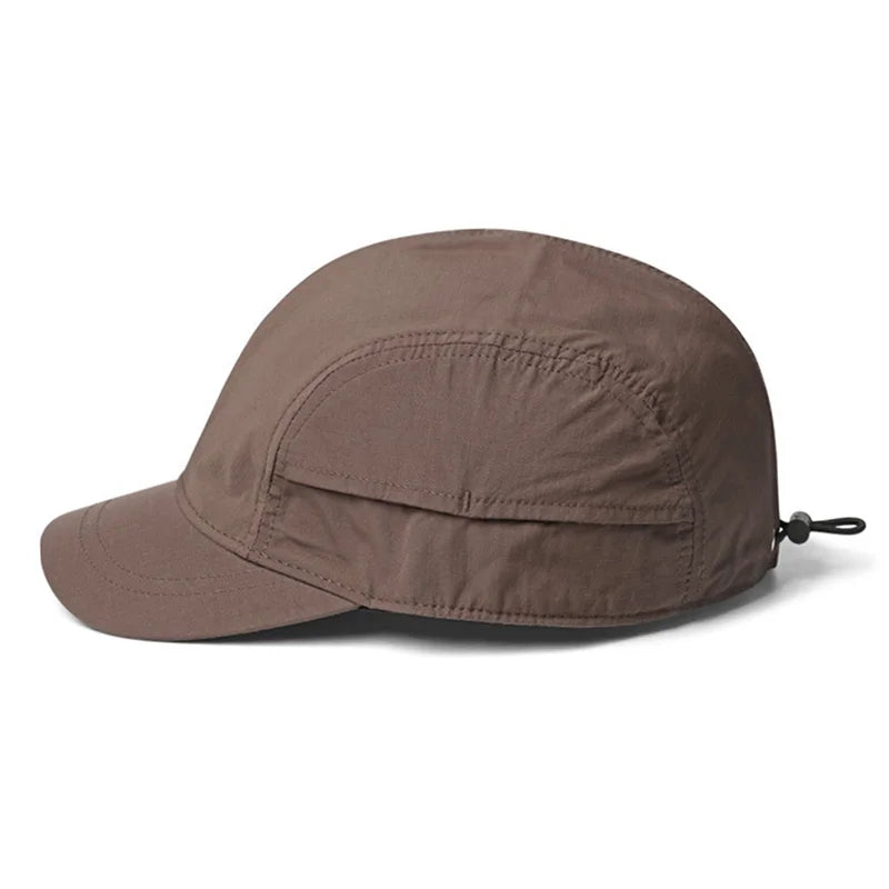 Brown cap with a strap on a white background