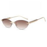 Gold-framed sunglasses with gradient lenses on a white background