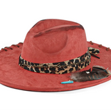 Burnt Orange Distressed wide-brim cowboy hat worn outdoors in natural light
