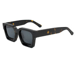 C02 Tortoiseshell Model wearing polarized square sunglasses in fourth colorway outdoors