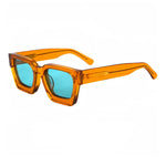 C18 Orange Blue Lifestyle shot of model wearing polarized square sunglasses outdoors