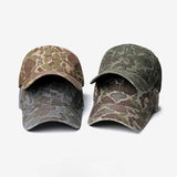 Two camouflage baseball caps on a white background