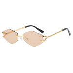 Gold-rimmed sunglasses with black arms on a white background