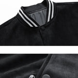 Close-up of a black jacket with white trim and buttons, featuring text on a white background.