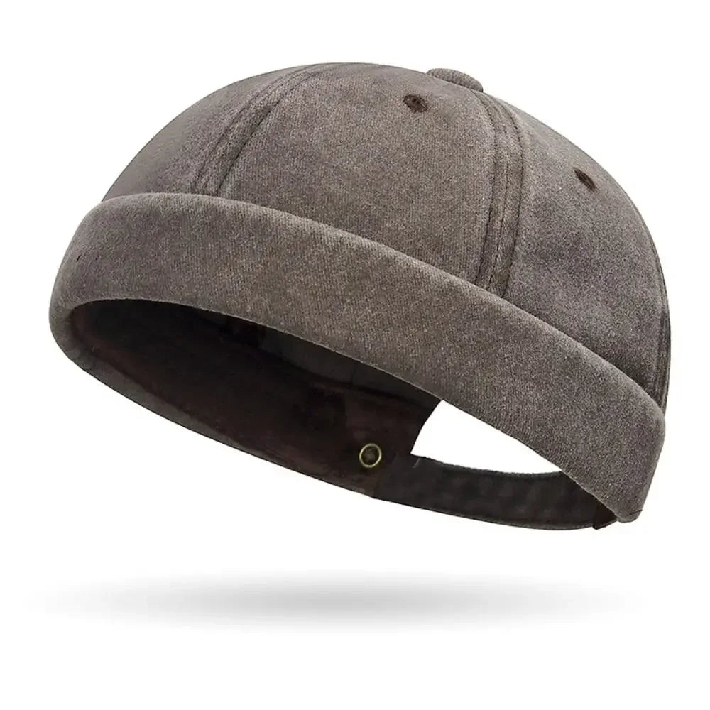 Gray beanie hat on a white background