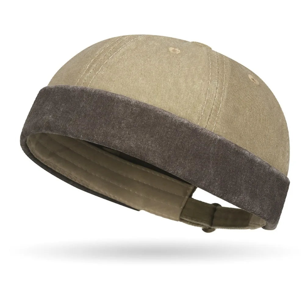 Beige cap with brown band on a white background