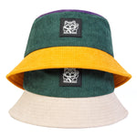 Color-blocked bucket hat with cat logo on a white background