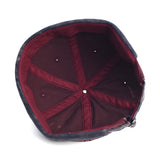 Cotton skullcap brimless hat — worn angled view