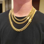Steel Cuban link chain necklace, flat lay