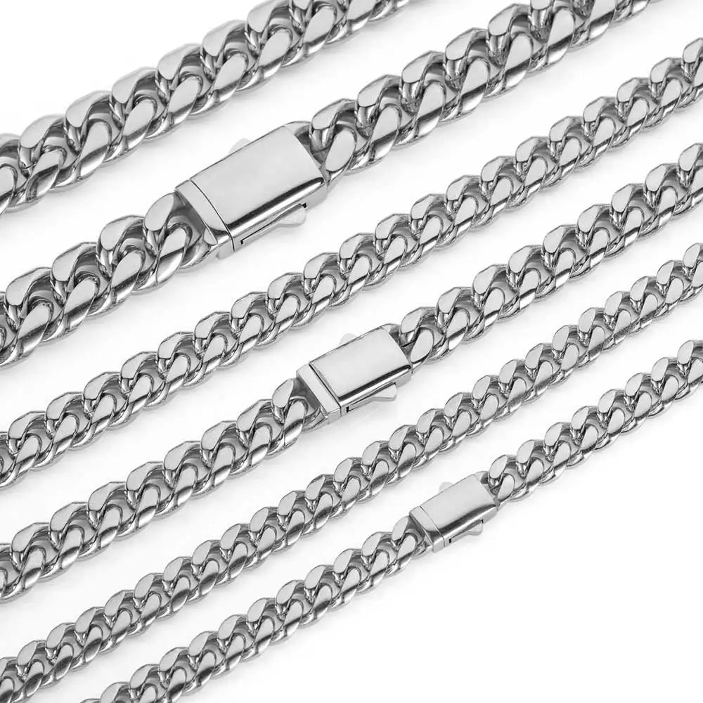 Steel Cuban link chain necklace stacked with other chains