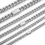 Steel Cuban link chain necklace stacked with other chains
