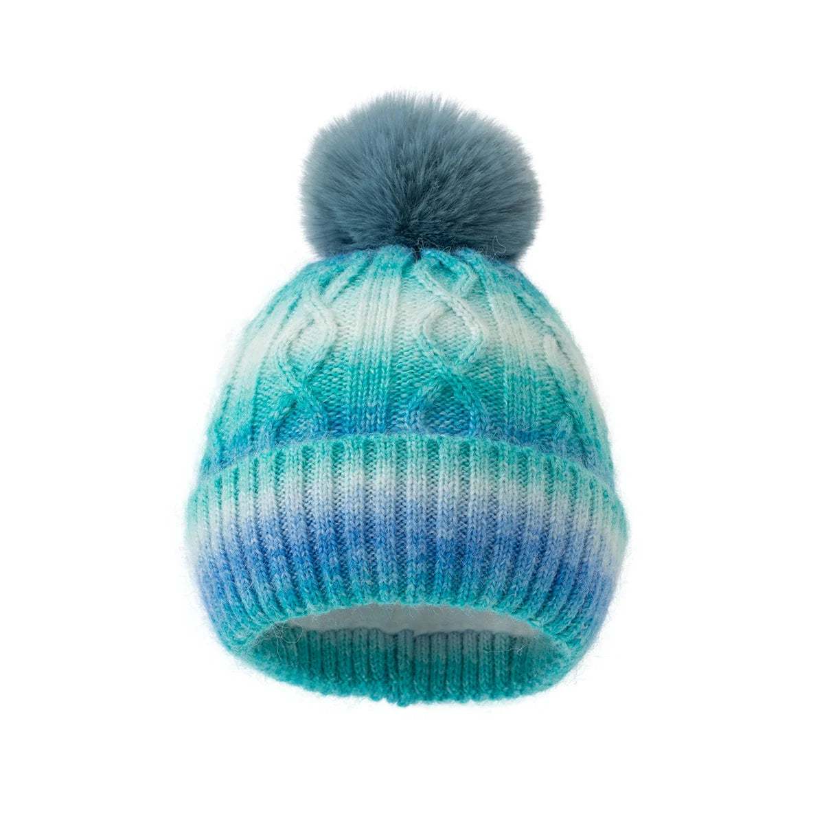 Knitted beanie with a pom-pom in gradient blue and green colors on a white background