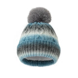 Knitted beanie with a gray pom-pom on a white background