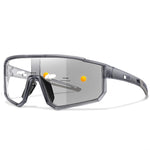 Dark Gray Wraparound sport sunglasses shown at angle with photochromic lens shading diagram