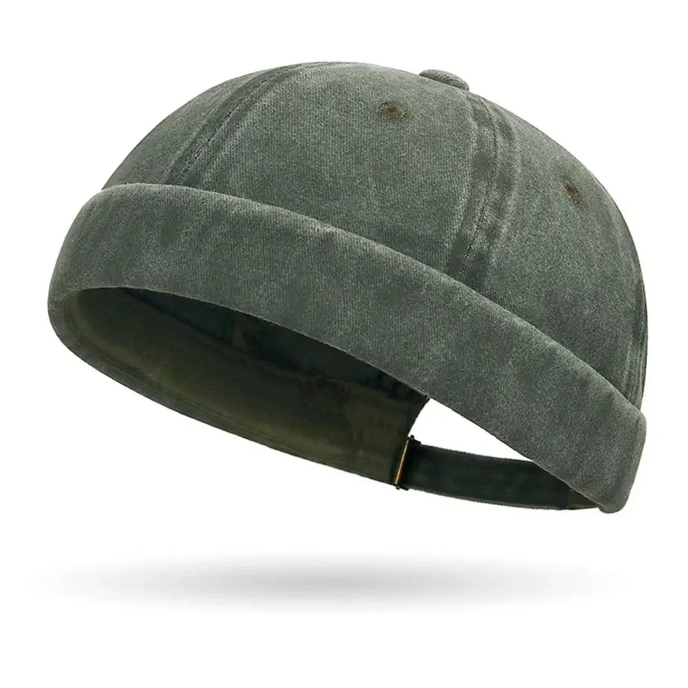 Green distressed baseball cap on a white background