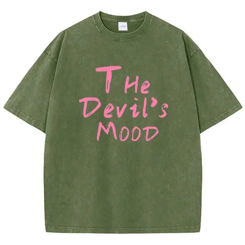 Dark green Devil's Mood washed oversized graphic tee — side view showing long hem and drop shoulder