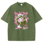 Dark Green Detail shot of oversized women's graphic tee fabric and print texture