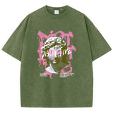 Dark Green Detail shot of oversized women's graphic tee fabric and print texture