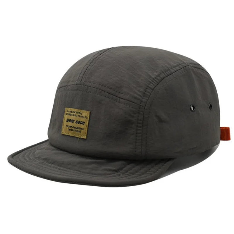 Dark Grey Vintage short brim 5-panel streetwear cap worn on model