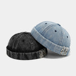 Distressed denim docker cap, angled view