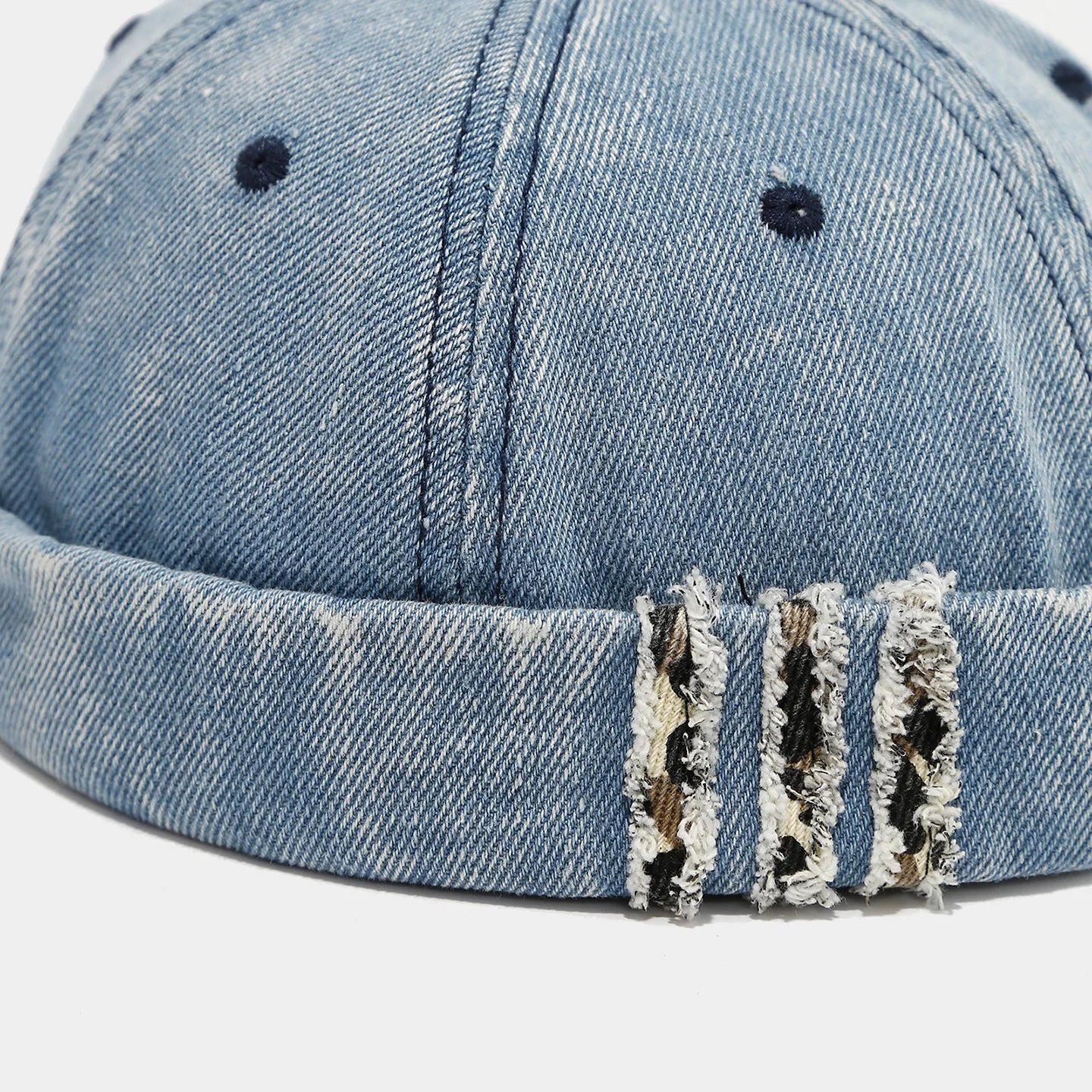 Distressed denim docker cap, fabric detail