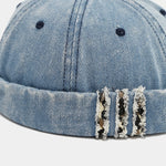 Distressed denim docker cap, fabric detail