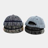 Distressed denim docker cap, side view