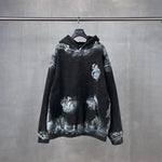 Distressed graffiti baggy hoodie, graphic detail