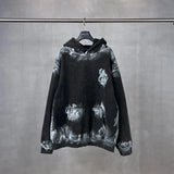 Distressed graffiti baggy hoodie, graphic detail