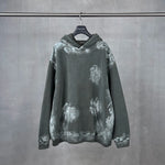 Distressed graffiti baggy hoodie, side view